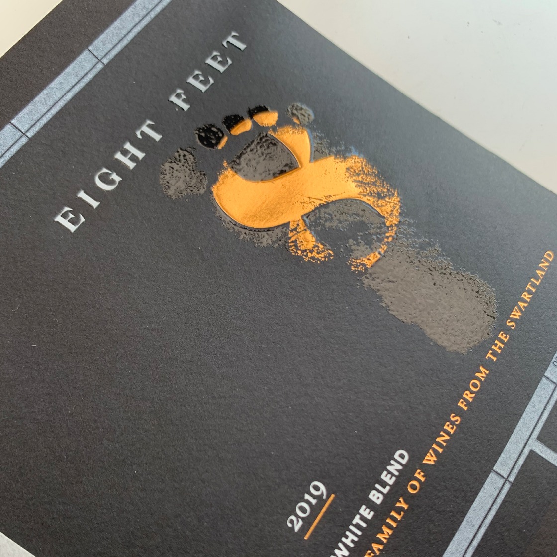 Eight Feet wine labels being printed