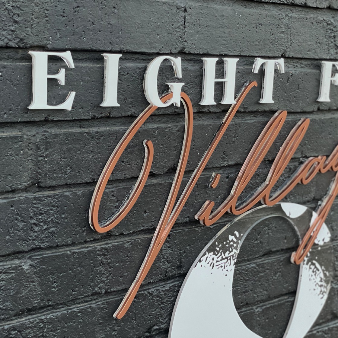 Eight Feet Village signage