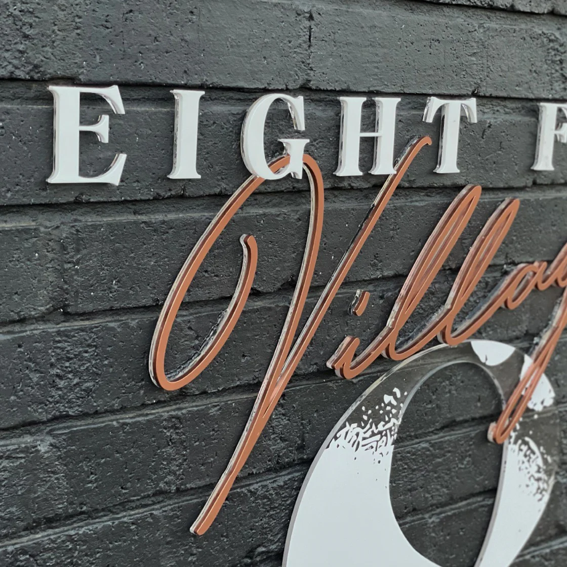 Eight Feet Village signage