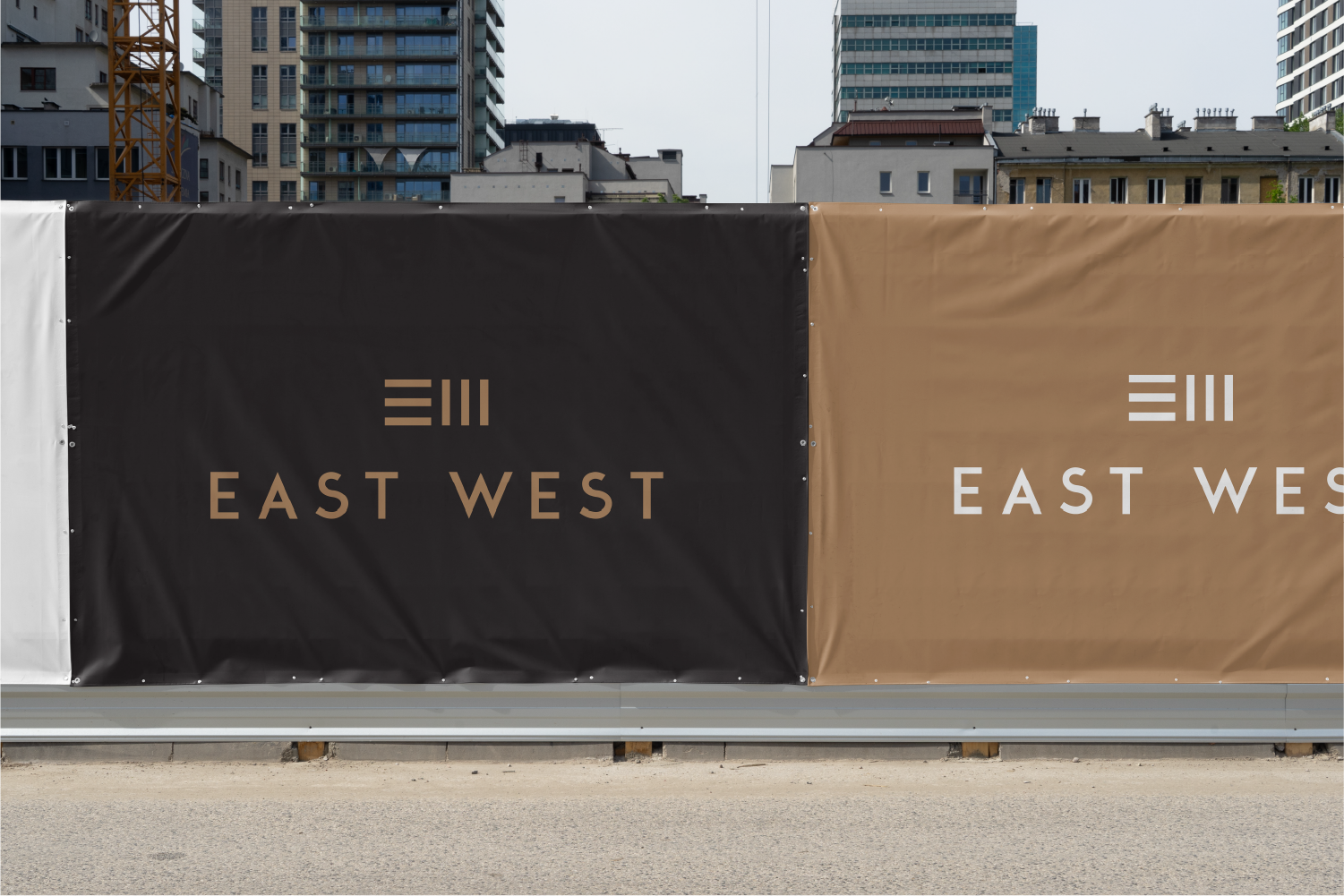 east west logo signage